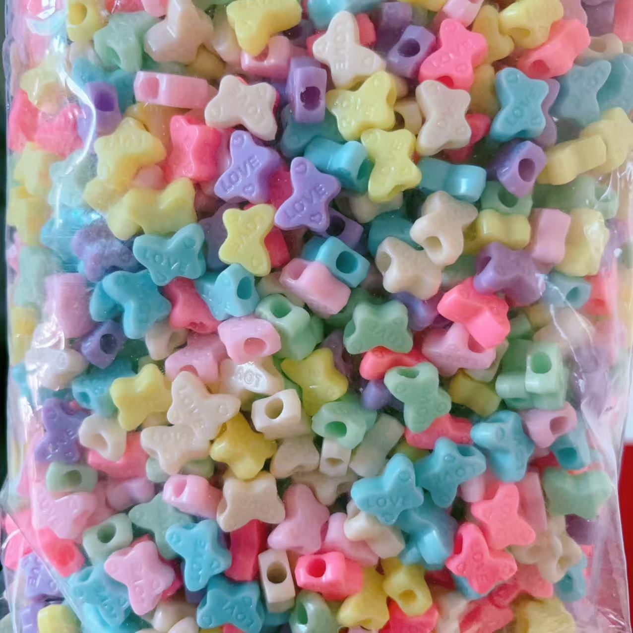 2025 Nuevas cuentas de cabello baratas en bolsa nuevas cuentas de plástico de color primavera diy gran agujero image 39