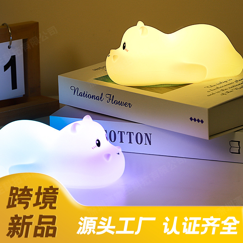 Transfronteriza nueva raqueta de hipopótamo Luz de silicona LED dormitorio luz de noche USB tiempo de carga luz del sueño Luz de La Noche