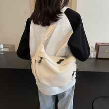 灯芯绒饺子包女2025韩版新款时尚百搭单肩包大容量轻便通勤斜挎包