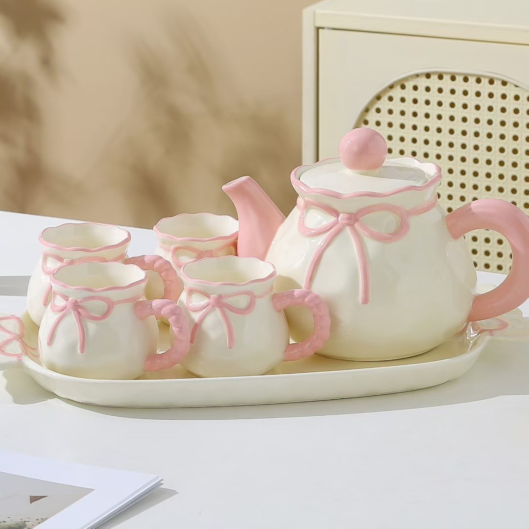Personalidad creativa de alto valor facial arco hervidor de agua fría conjunto de tazas de cerámica acuario conjunto de nicho regalo de cumpleaños