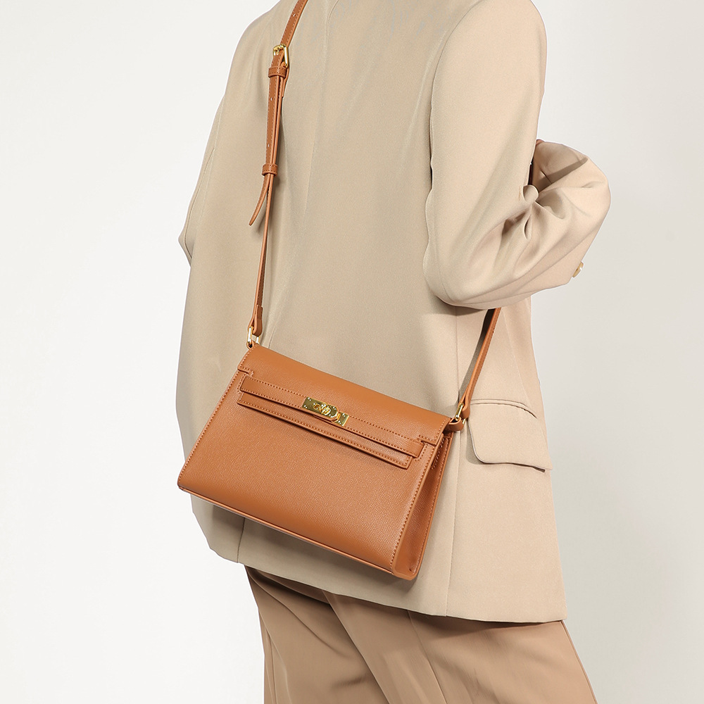 El nuevo bolso Kelly en otoño e invierno de 2024 está lleno de bolsos para mujeres con un solo hombro y axilas, y el diseño de nicho es un bolso de palo de textura avanzada.