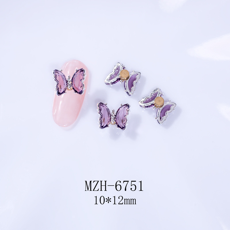 Giratoria de uñas mariposa joyería en línea celebridad tridimensional Rosa cristal alas accesorios DIY mariposa joyería de uñas Taladro