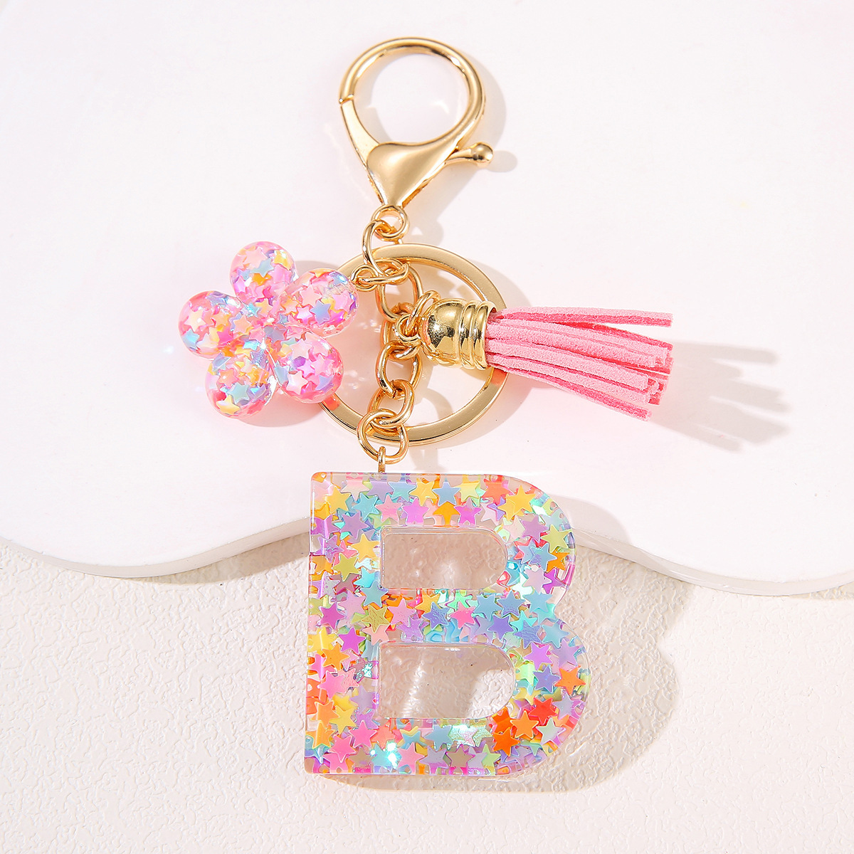 Un nuevo llavero flor de goteo de goma esquinilla 26 letras bolsos colgante llavero accesorios Yiwu