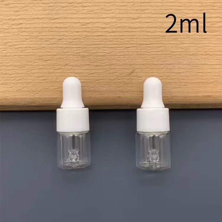 Botella de goteo botella de aceite esencial botella de esencia cosmética líquido muestra pequeña botella vacía portátil botella de vidrio 5 / 10ml