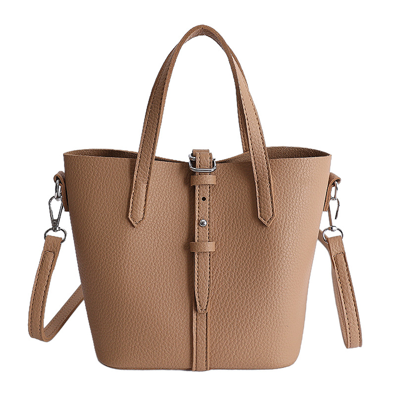 Nicho coreano canasta de platos portátiles bolsos de cubo para mujeres 2026 ventas calientes nuevas bolsas de hombro casuales de gran capacidad