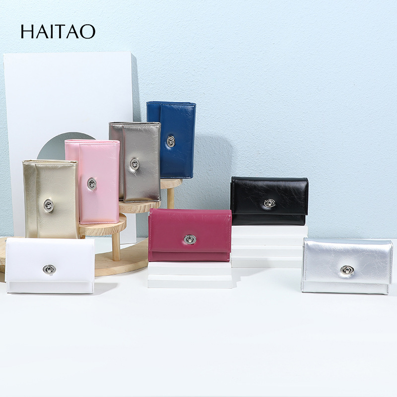 Nuevo tipo de billetera de mujer transfronteriza tres plegables cera de aceite billetera de cuero de gran capacidad multi-tarjeta de alta calidad billetera de cambio para mujeres