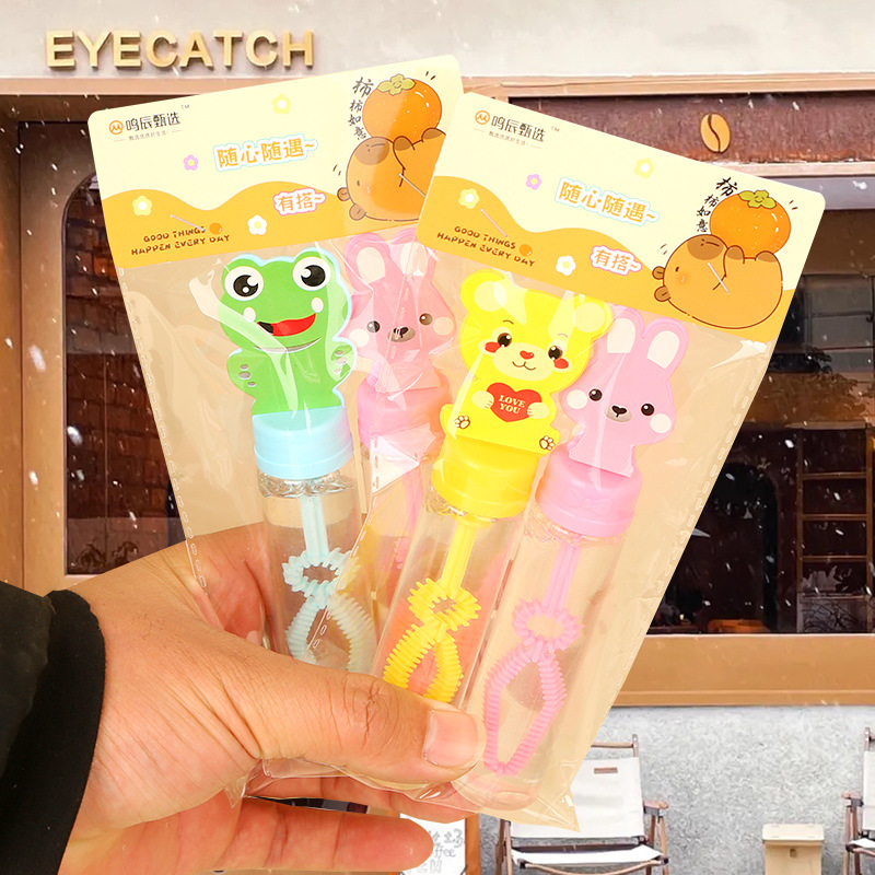 Barras de burbuja de dibujos animados de sonido pequeño juguete de burbuja de mano para niños y niñas regalos de vacaciones al por mayor