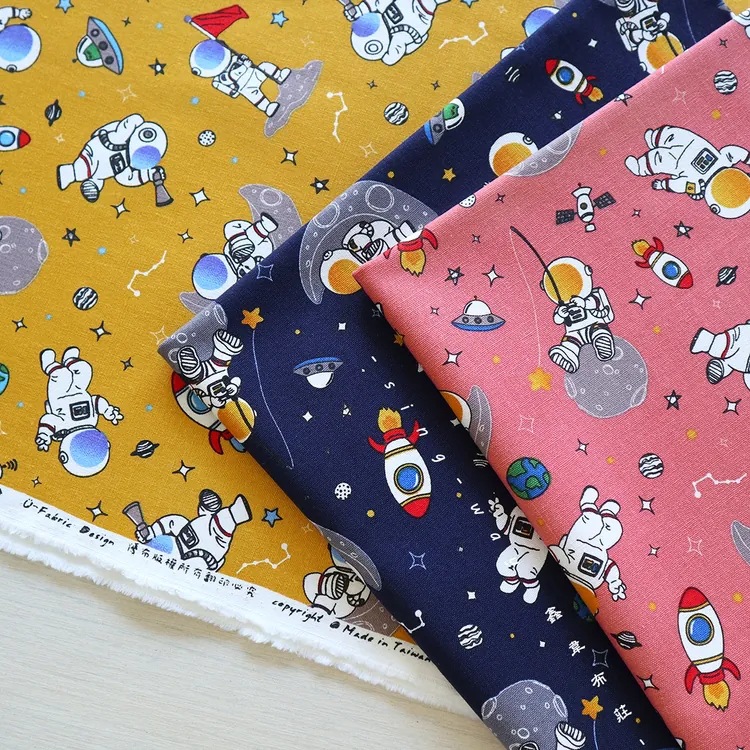 台湾厚棉布星空宇宙印花面料手工口金抱枕包包面料纯棉仿棉麻