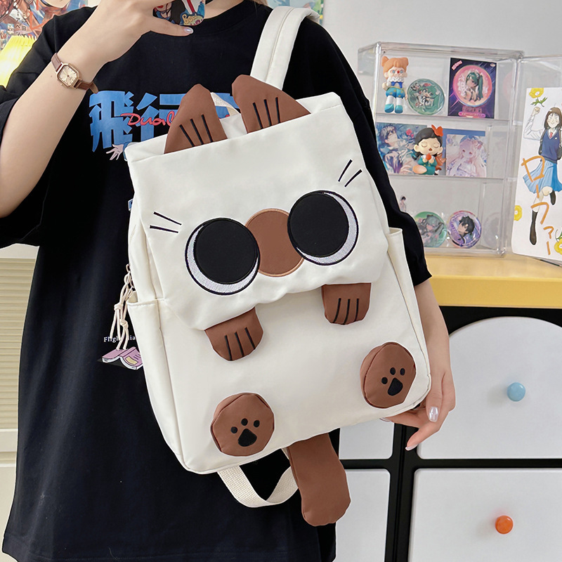 Korean style new back-to-school student backpack, personalized anime cartoon backpack, cute and ugly cat design, lightweight travel backpack.