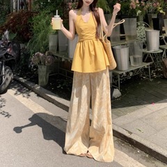 韓国の新しい純粋な欲望スタイルのホルターネック V ネックノースリーブベストサスペンダー女性の夏のニッチプリントカジュアルパンツ 2 点セット