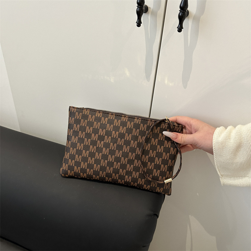 Impresión cuadrada otoño e invierno bolsas de mano casuales universales para mujeres de alta calidad temperamento simple nicho de moda bolsas de cena