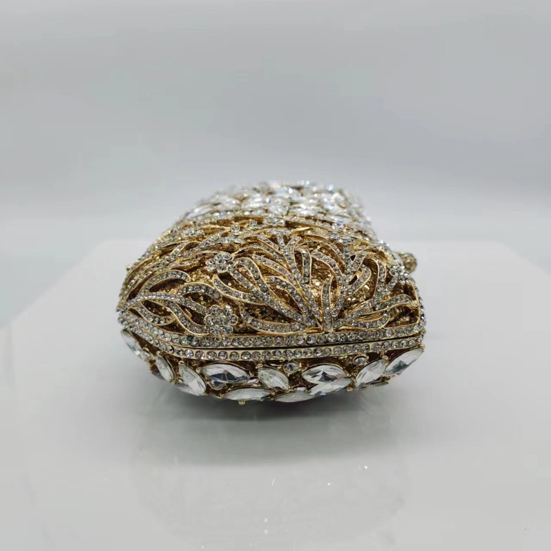 * Bolsa de cena de diamantes de lujo nueva bolsa de metal hueco con diamantes completos bolsas de mano europeas y americanas bolsas de banquete de mujeres bolsas de cristal