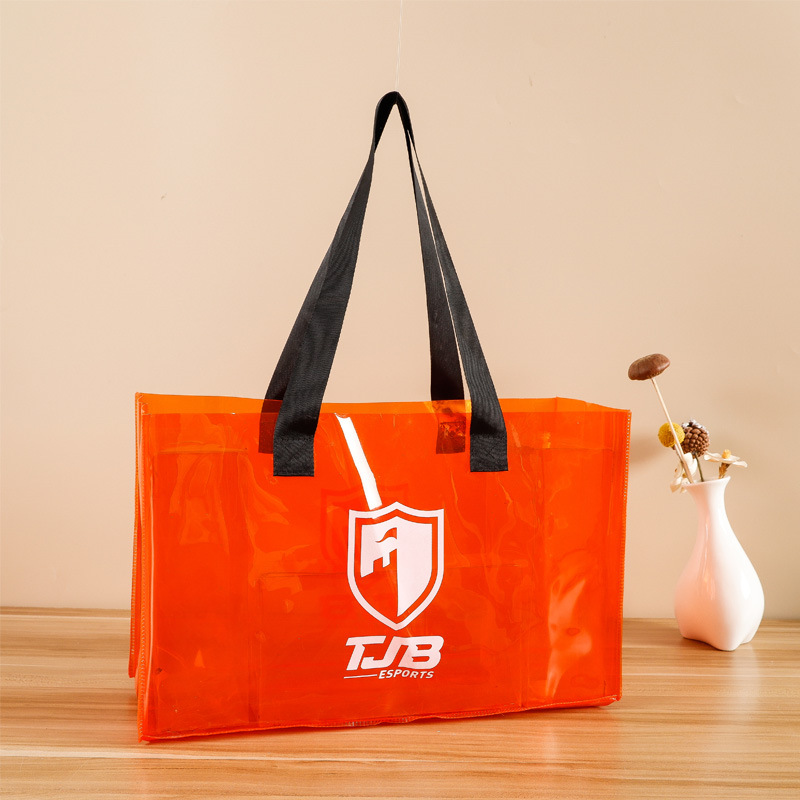 橙色PVC手提袋酷炫镭射购物袋展会透明塑料果冻包生日伴手礼品袋