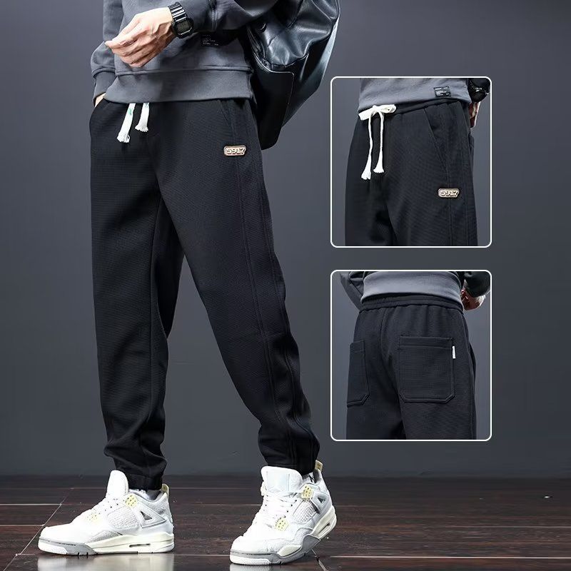 Pantalones de hombre transfronterizos de otoño y invierno, pantalones deportivos sueltos con cordón, pantalones cálidos y casuales más gruesos