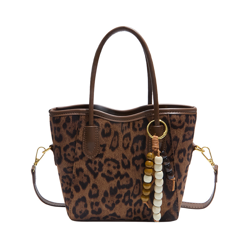 2025 otoño y invierno nuevo bolso de alta calidad bolso de cubo de agua universal bolso de hombro popular de mujer retro mochila esmerilado