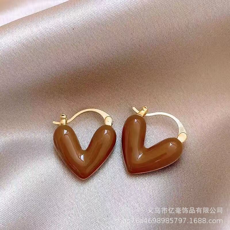 S925 Pendientes de perlas de temperamento Pendientes de lujo ligero de alta gama Pendientes al por mayor y al por menor transfronterizos Mujeres