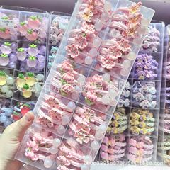 甘いピンクの夜光珠春の立体桜の花の子供の馬尾のシュシュの高弾力の少女の皮の筋のひも