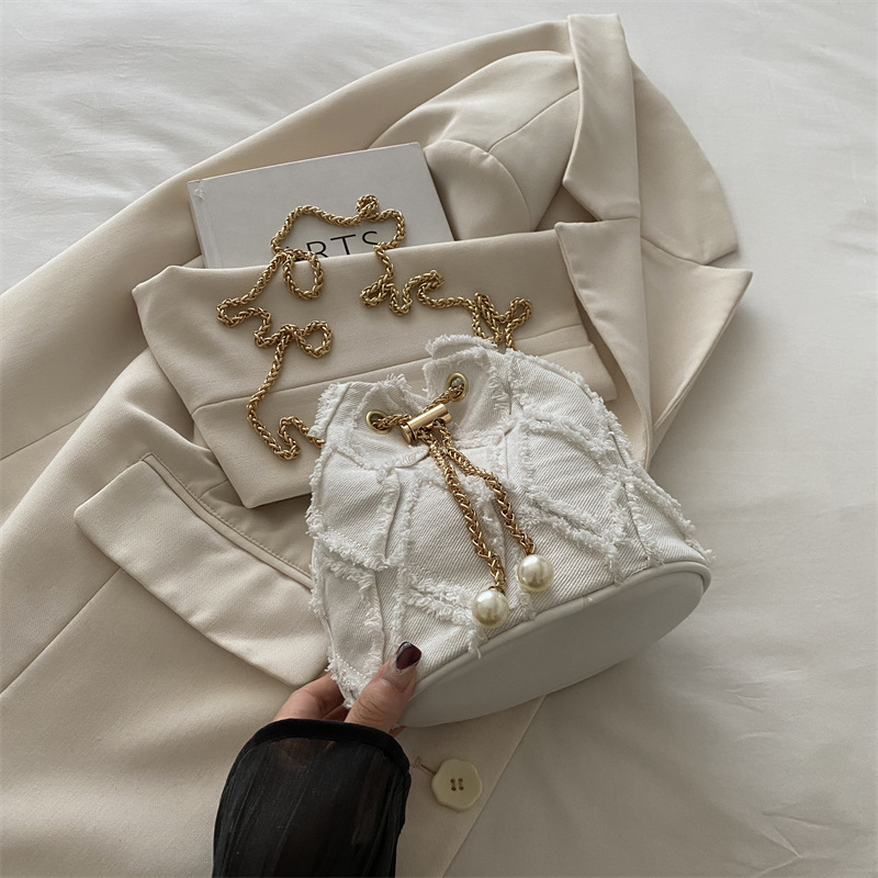 Nicho de diseño bolso de cubo otoño 2024 nuevo bolso de cordón de dibujo bolso de mujer mochila de moda simple bolso de hombro