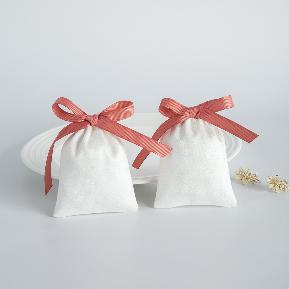 9g Weight Jewelry Packaging Bags Classification 1 Piece Quantity Daily Occasion Flannel Material Bow Knot Pattern Simple Style Style 1 Piece Flannel Simple Style Daily Bow Knot Jewelry Packaging Bags 4
