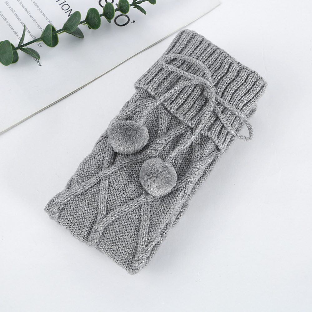 Calcetines grises por encima de la rodilla