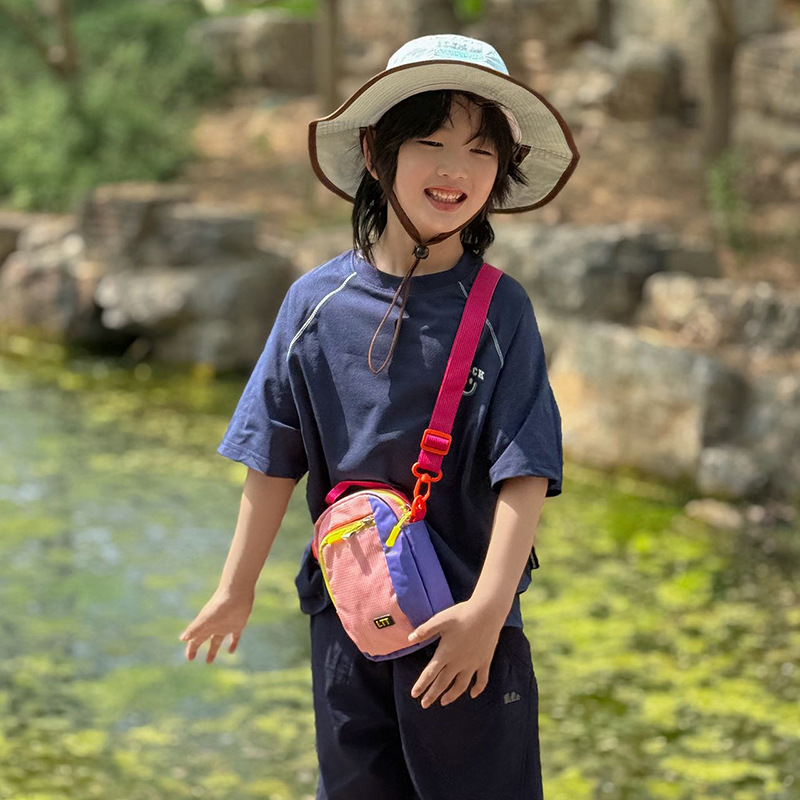 2026 nuevo cross-border bolso infantil casual ligero al aire libre montar mochila de moda color contraste bolso de hombro para hombres y mujeres