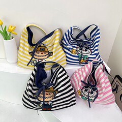 韩版卡通小怪兽单肩女包2025新款彩色条纹休闲帆布包外出通勤包包