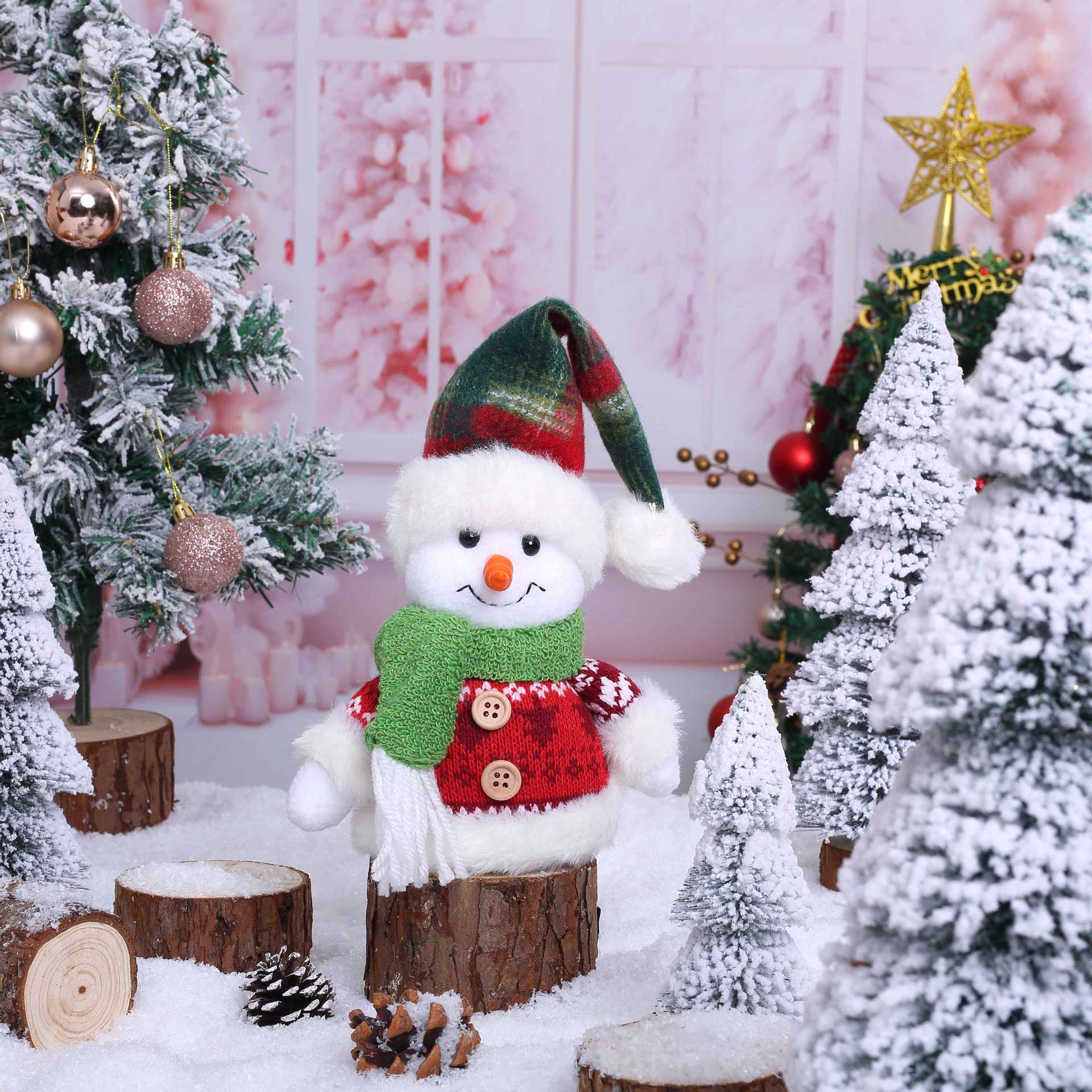 Adorable muñeco de nieve de Navidad sentado muñeca ventana decoración cruzada Rudolph sombrero muñeca decoración al por mayor