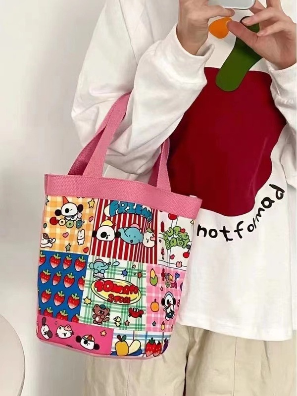 かわいい落書きバケツバッグinsプリント円筒バッグキャンバス弁当袋韓風少女は弁当箱を持っています。|undefined