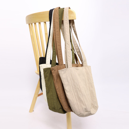 Guangzhou luggage Korean version bucket bag new wrinkle bag ins Korean canvas shoulder bag female armpit bag cross-border