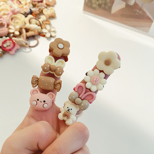 Candy-colored children's cute little bear rubber band flower hair band baby does not hurt the hair and has good elasticity for girls and babies.