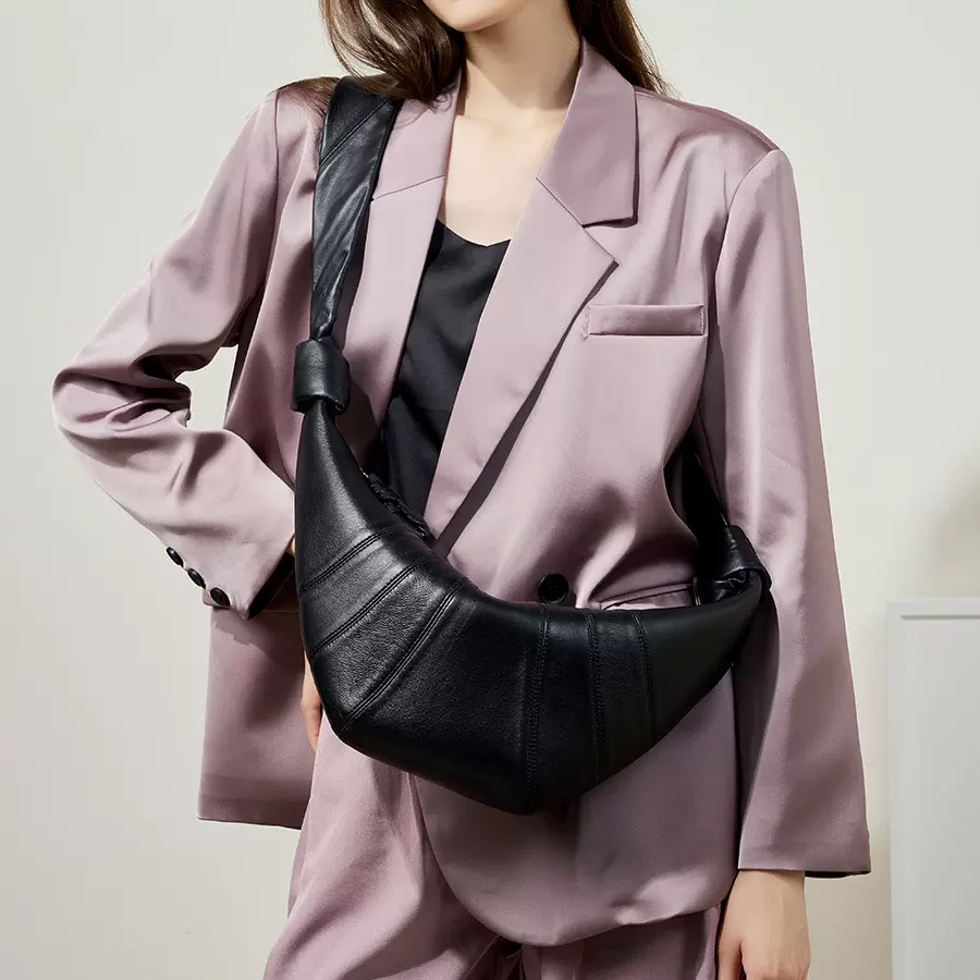 通勤2025新款百搭头层小羊皮牛角包慵懒饺子包女单肩斜挎包