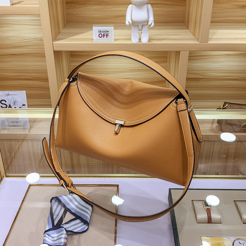 Bolso crossbody de alta textura 2024 primavera y verano nueva moda todo partido moda lujo nicho de cuero suave hombro cercanías mujeres