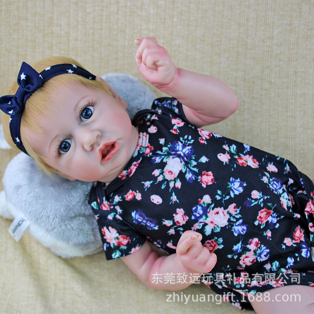 Ia suave pesado comercio electrónico bebé 22 pulgadas venta al por mayor muñecas juveniles calientes juguetes de goma de acero muñecas rubias