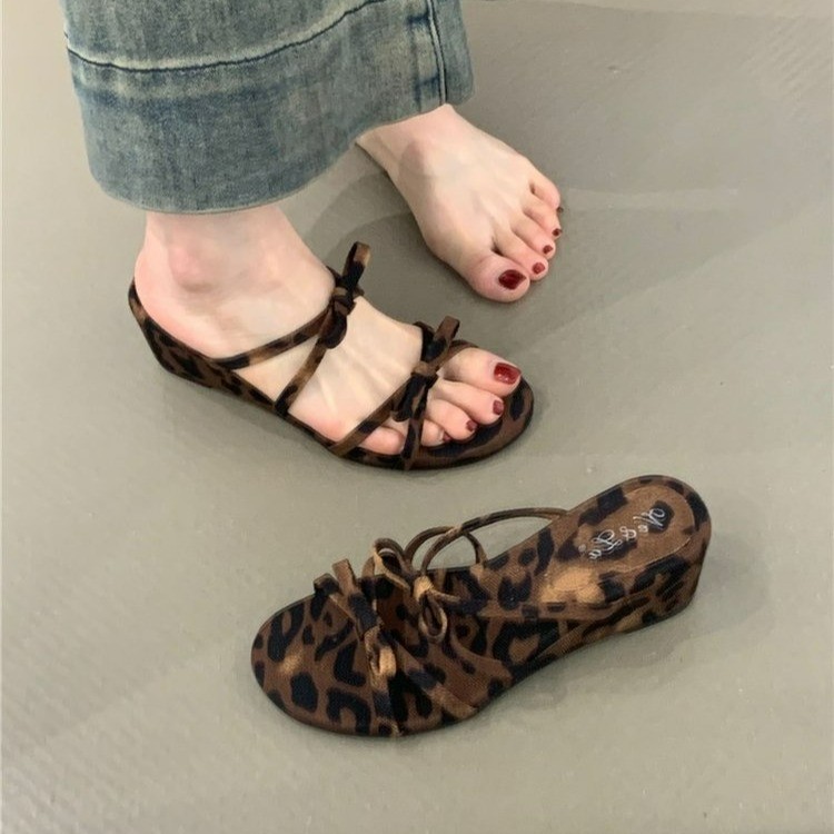 Elegant summer sexy mule made of sheepskin leather with bow heels