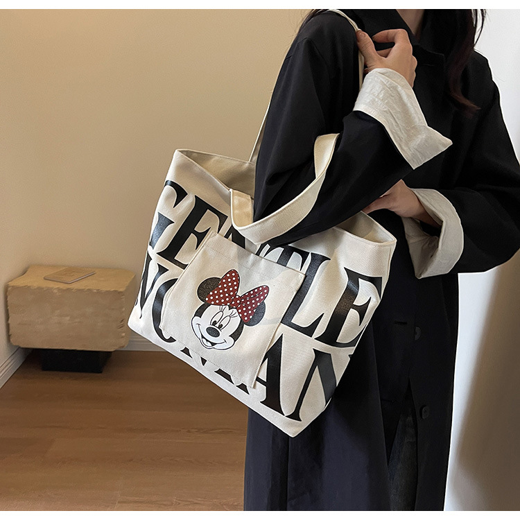 2024 New canvas bag for women, single-shoulder, student, book, large-capacity hand-held bag with zipper, versatile for office workers' commuting undefined