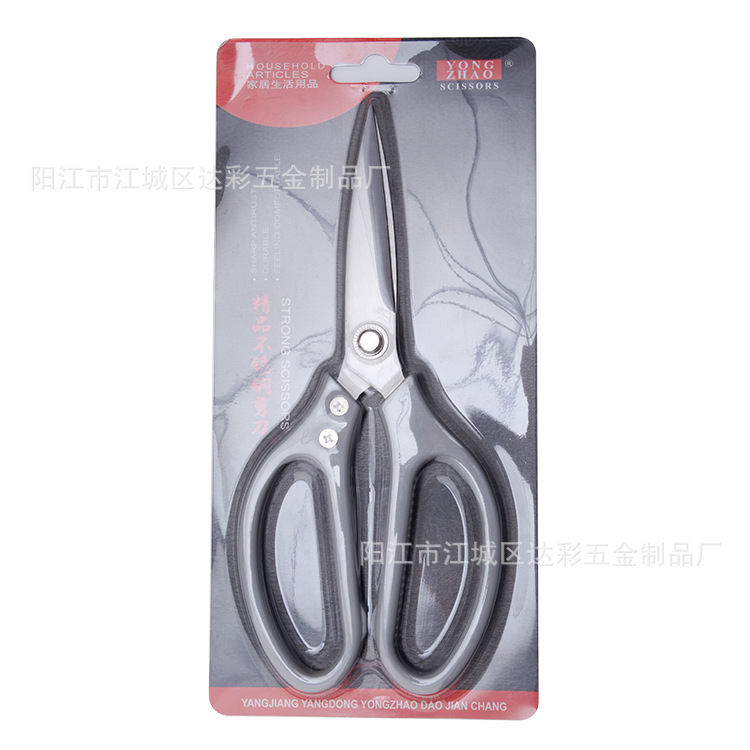 플라스틱 손잡이 가위가있는 회색 클립