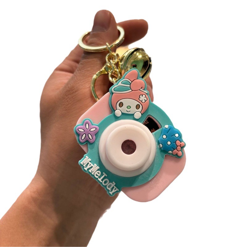 Llavero de cámara de proyección Kulomi de dibujos animados Sanrio Big Ear Dog Pareja Coche mochila colgante pequeño regalo