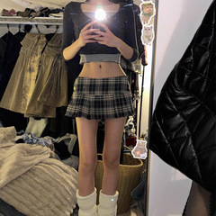 アメリカのギャルの低い腰の格子の半身のスカートの女性の春の学院の風格の紋様のJKのプリーツのスカートはやせているa字のミニスカートを現します。