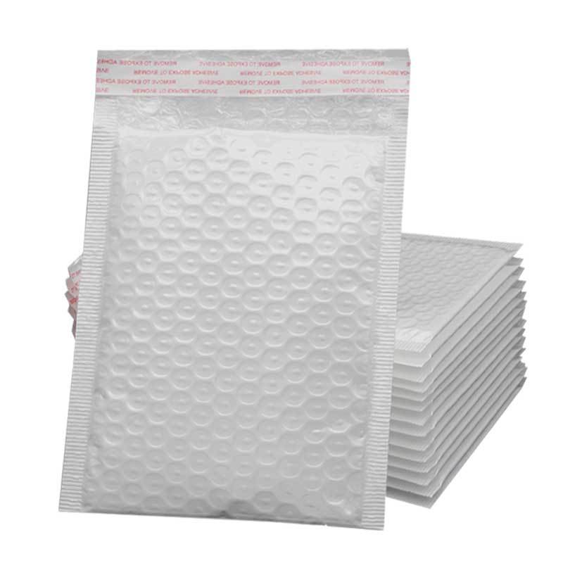 Fábrica en stock blanco perla película burbuja bolsa ultra ligero impermeable a prueba de golpes espuma sobre bolsa de burbuja en stock