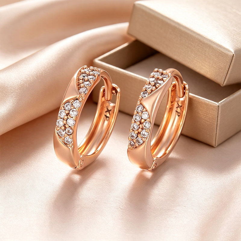 Pendientes de aro Xuping transfronterizos rusos de 18k con incrustaciones de diamantes, joyería de lujo ligero de alta gama al por mayor para mujer.