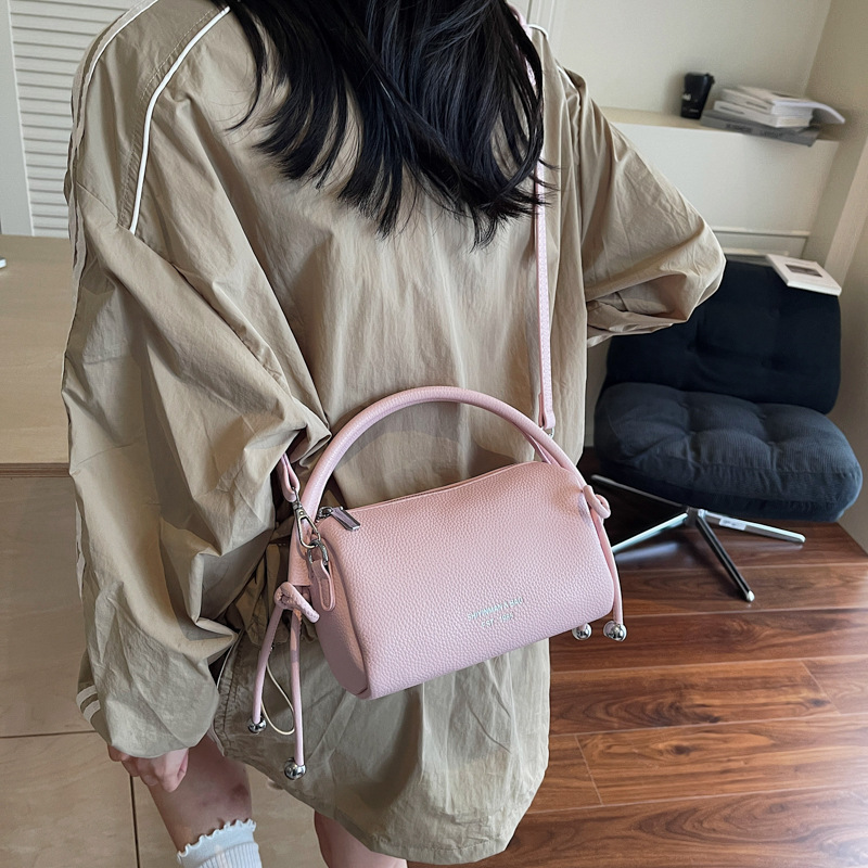 Bolso de mano simple coreano para mujeres 2025, nuevo tipo de bolso de viaje, bolso casual, ligero y de alta calidad.