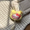 Брелок KT кот (переодевание, с кисточкой)