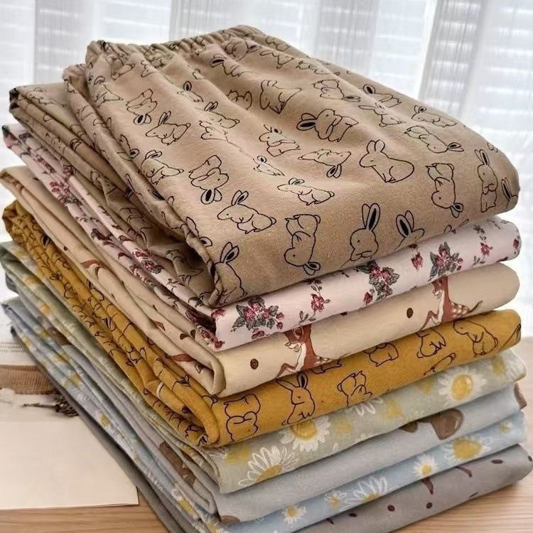New plus-size, loose-fitting, casual long pants for plus-size women weighing 80-300 jin (40-50 catties), perfect for spring and summer. Comfortable cartoon-themed loungewear.