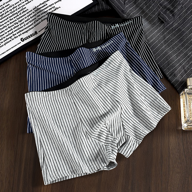 Pantalones de algodón de hombre, pantalones de cuatro rayas de hombre, pantalones de cuatro pantalones de hombre cómodos y transpirables, una al por mayor.