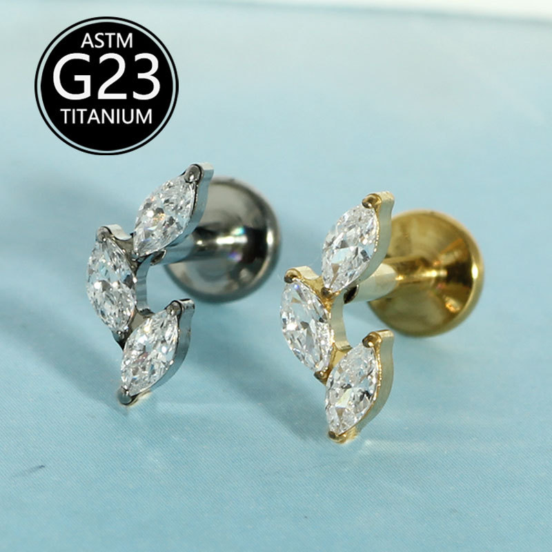Silver pointed spike labret stud material detail