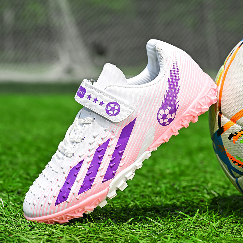 A generation of children's football shoes teenagers boys and girls students broken nails velcro grass training sneaker