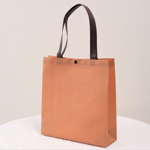 Internet celebrity women's clothing store concealed buckle non-woven handbag environmentally friendly handheld shopping bag women's clothing accessories can be printed with logo