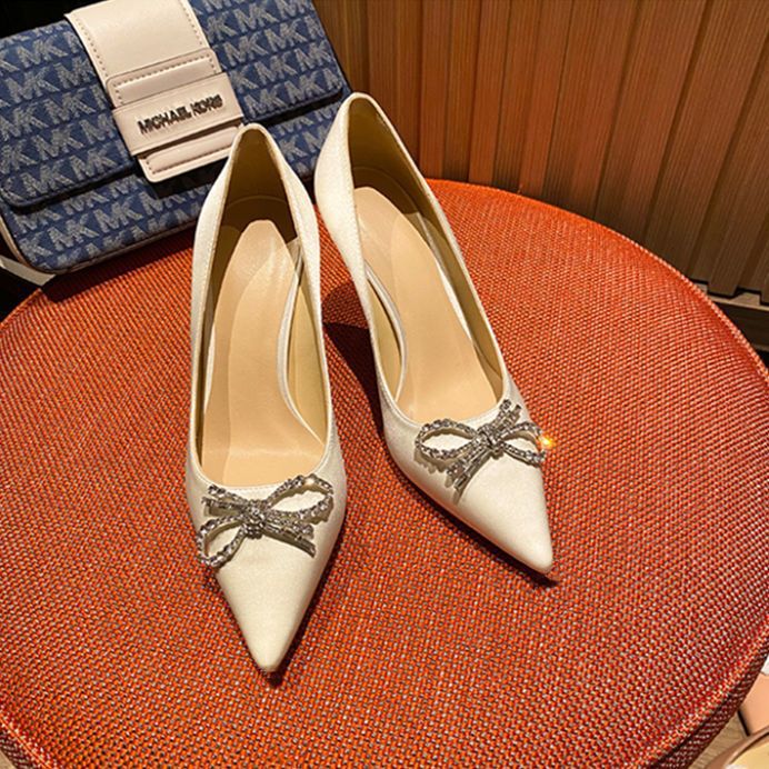 Women's high-heeled shoes with thin heels, 2026 new autumn niche white wedding shoes with rhinestone bow and black pointed toe Women's high-heeled shoes with thin heels, 2026 new autumn niche white wedding shoes with rhinestone bow and black pointed toe