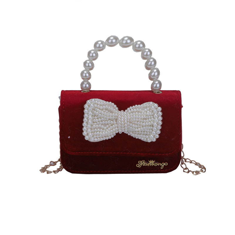 Mochila de niños estilo extranjero princesa perla de viento pequeño cambio bolso de hombro de niña encantadora