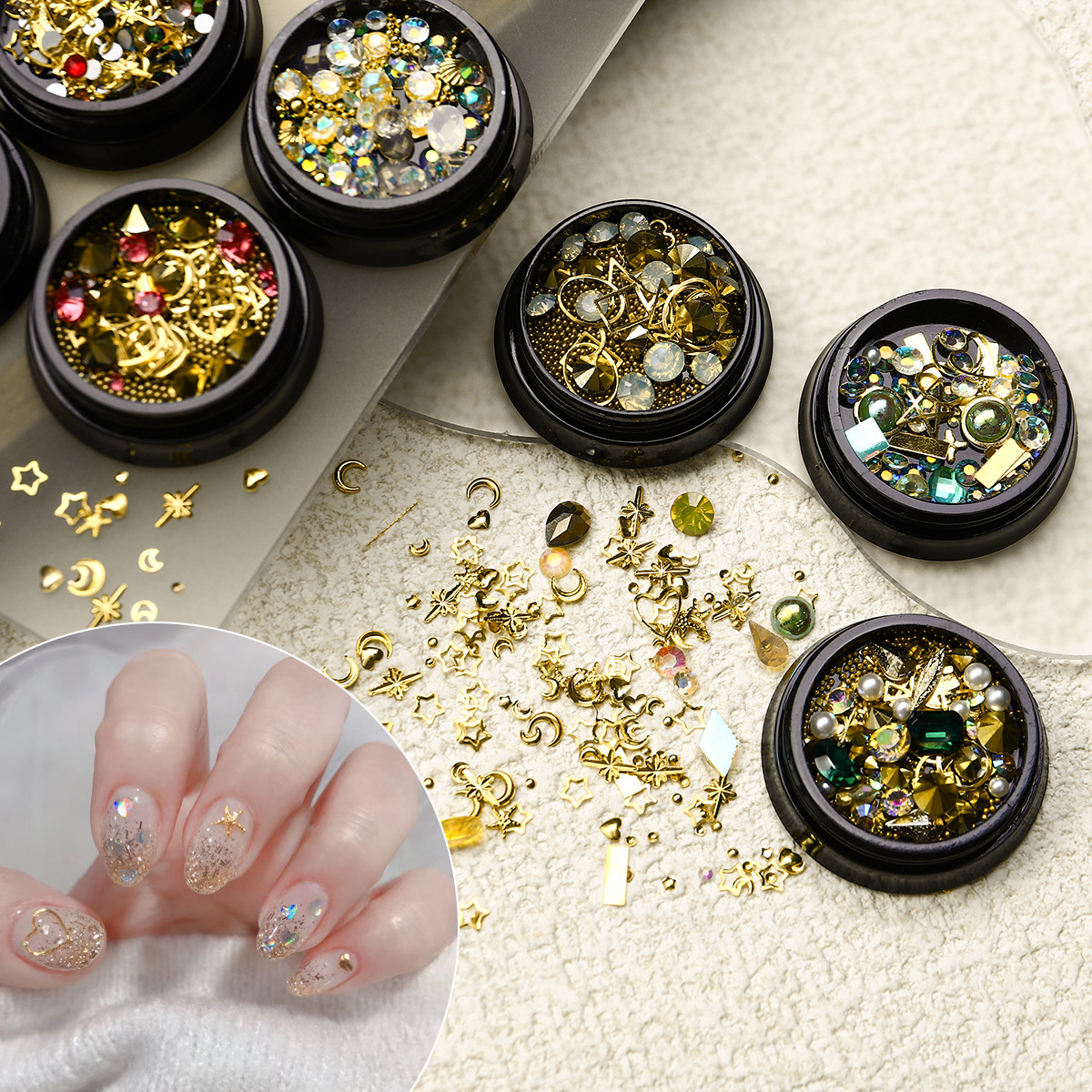 Nuevas joyas de manicura transfronterizas joyas de la luna de estrellas mezcladas caja de metal conjunto de cobre popular remaches accesorios de manicura